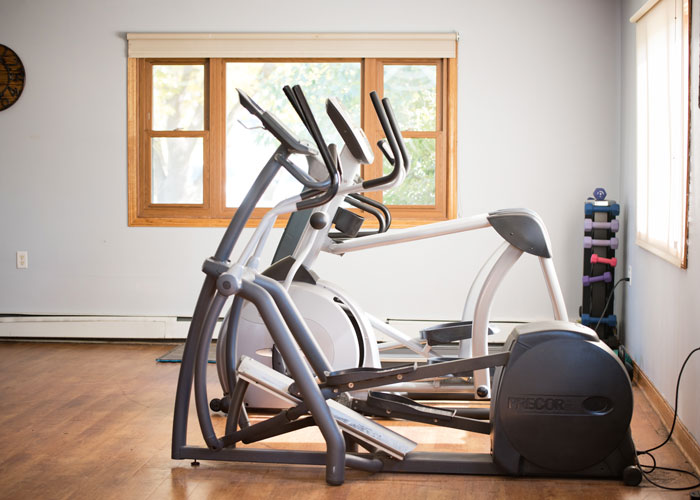cardio machines in well lit exercise room at St. Gregory Recovery Center - Iowa drug and alcohol treatment center - co-occurring disorder treatment in Bayard, IA