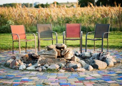 chairs around fire pit - St. Gregory Recovery Center - Iowa faith-based rehab - co-occurring disorder treatment in Iowa