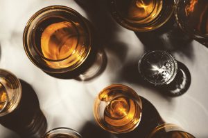 overhead shot of alcoholic beverages - binge drinking - substance abuse